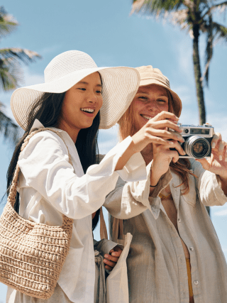 two girls on vacation taking a picture